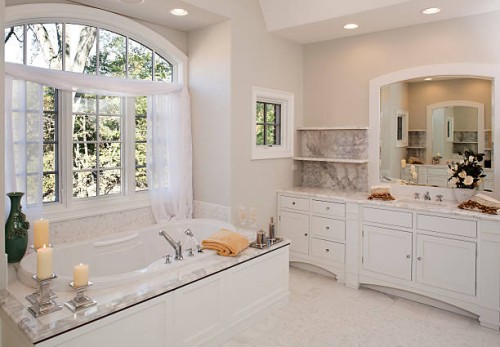 custom white toned master bathroom with hot tub tub. - fashion stock pictures, royalty-free photos & images