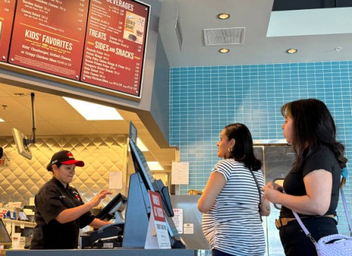 Customer places in order at The Habit Burger Grill on April 11, 2024 in San Rafael, California.