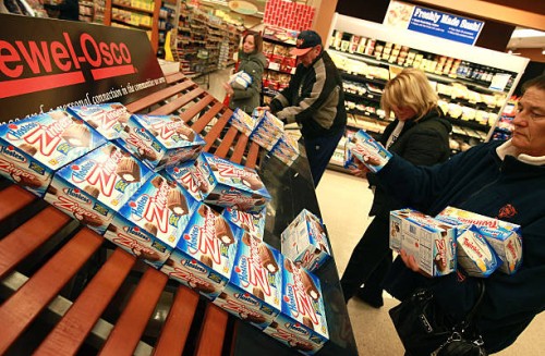Customers grab up Hostess snacks at a Jewel-Osco grocery store on December 11, 2012 in Chicago, Illinois. The Jewel-Osco grocery store chain...