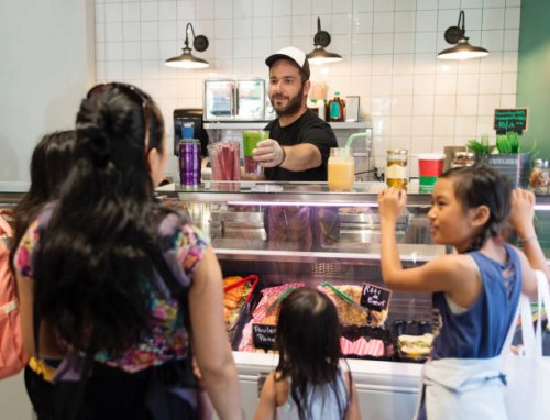 customers in zero waste oriented grocery and take out food store. - junk food stock pictures, royalty-free photos & images