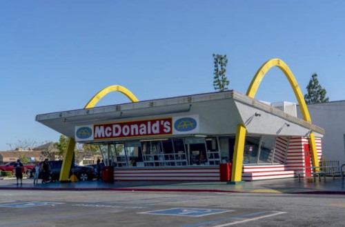 Customers order food at the oldest operating McDonald's Corp. Restaurant in Downey, California, U.S., on Monday, April 27, 2020. McDonald's is...