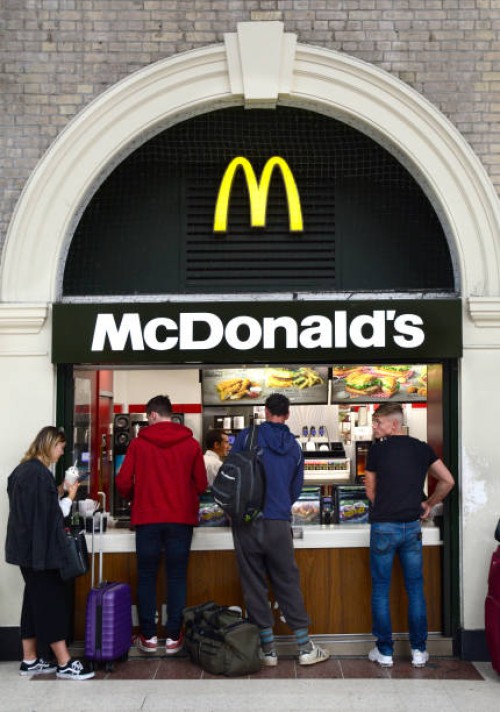 Customers purchase lunch at a McDonald's fast food restaurant located in London Victoria train and underground station in London, England.