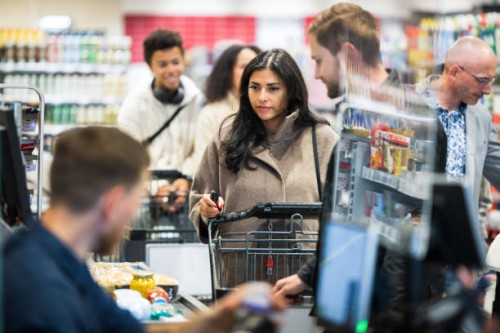 customers queuing at checkout in local supermarket - food stock pictures, royalty-free photos & images