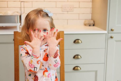 cute 3 year old showing off her nails after being painted by her cool aunt - nails art stock pictures, royalty-free photos & images