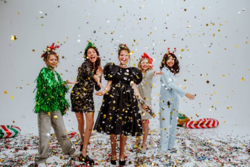 cute teen girls with hairdressers posing in studio with confetti and balloons. - fashion stock pictures, royalty-free photos & images