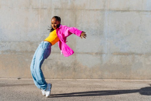 dancer on tip toe in front of wall - fashion stock pictures, royalty-free photos & images