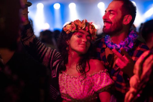 dancing couple at festival - concert stock pictures, royalty-free photos & images