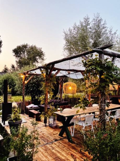 decorated table in summer setting. garden party. summer garden patio terrace. rotan light. ibiza vibe. - garden decoration stock pictures, royalty-free photos & images