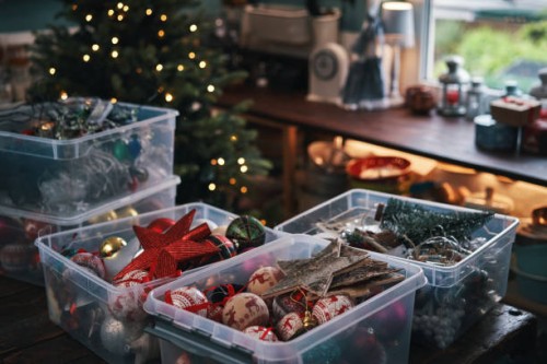 decorating christmas tree with ornaments and christmas lights - home decoration stock pictures, royalty-free photos & images