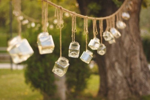 decoration jars hanging from trees in a park - garden decoration stock pictures, royalty-free photos & images
