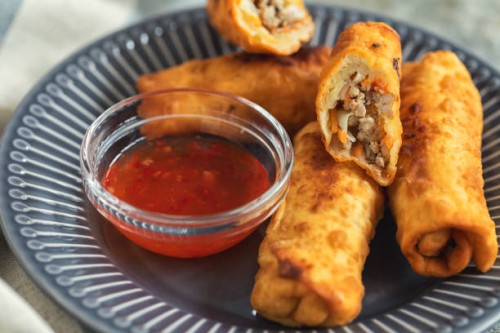 deep fried egg rolls with soy sauce - junk food stock pictures, royalty-free photos & images