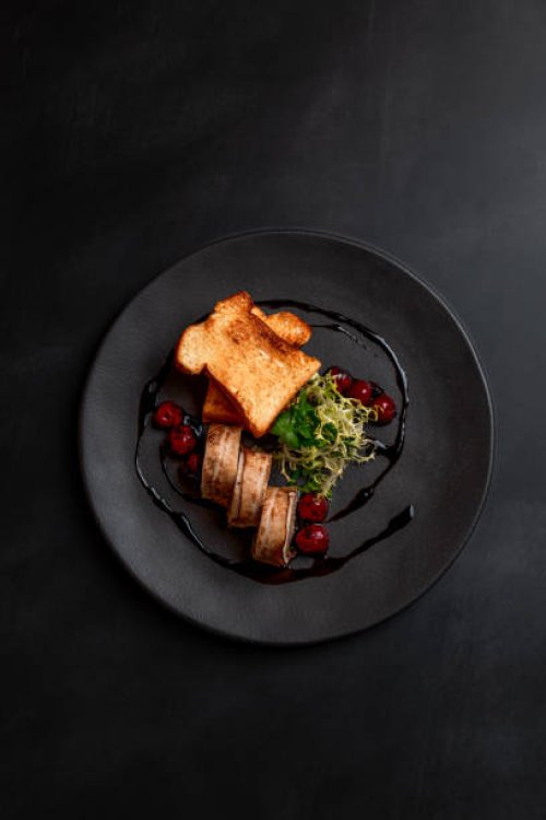 deer minced meat terrine dish duck breast with balsamic cherries in michelin star gourmet restaurant on dark background - food stock pictures, royalty-free photos & images