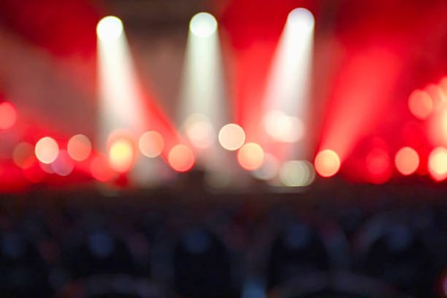 defocused illuminated lights at night music - concert stockfoto's en -beelden