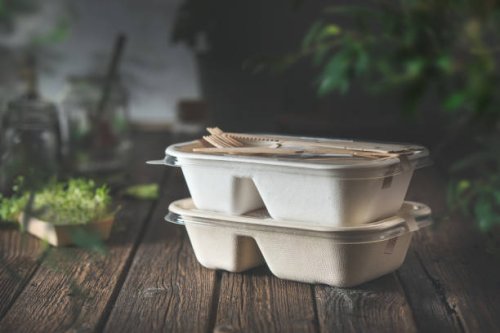 delivered food in eco friendly paper packaging boxes on wooden table . - junk food stock pictures, royalty-free photos & images