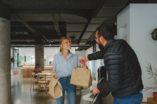 delivering food to the office - food stock pictures, royalty-free photos & images