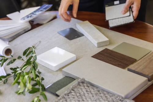 designer laying out a sample board - home decoration stock pictures, royalty-free photos & images