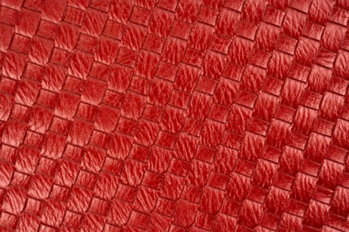 detail of woven red color leather a textured background. - home decoration stock-fotos und bilder