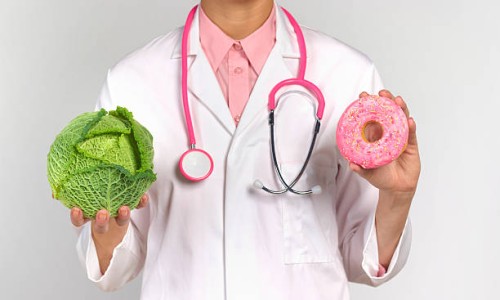 dietician with healthy and unhealthy food - junk food stock pictures, royalty-free photos & images