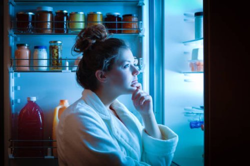 dieting young woman late night making choices on what to eat - food stock pictures, royalty-free photos & images