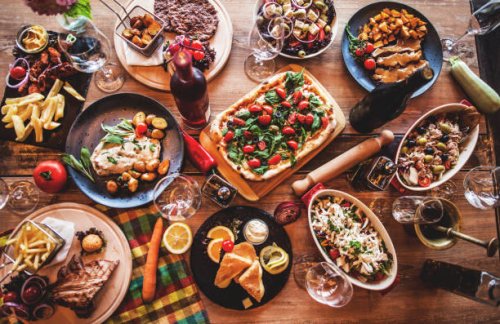 different food cooked on a wooden table - food stock pictures, royalty-free photos & images