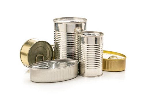 different tins of food isolated on white background - food stock pictures, royalty-free photos & images