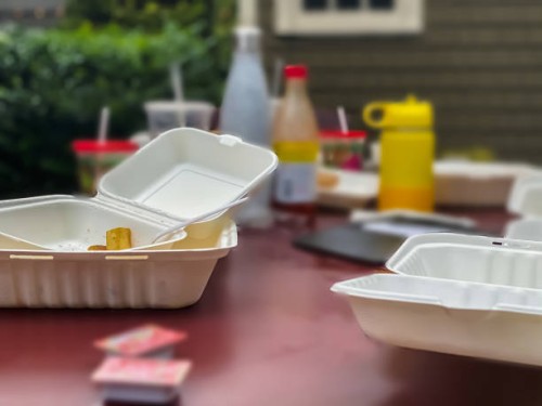 dining out using takeout containers, reusable water bottles & plastic cutlery - junk food stock pictures, royalty-free photos & images