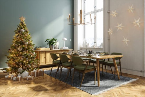 dining room interior with christmas tree, gift boxes and christmas table setting - home decoration stock pictures, royalty-free photos & images