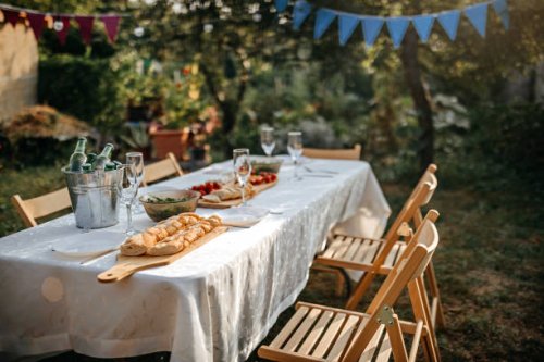 dining table with appetizers for birthday party at backyard - garden decoration stock pictures, royalty-free photos & images