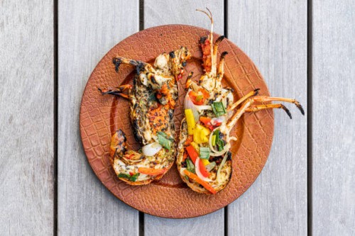 dish with stuffed grilled lobsters, overhead view, caribbean - food stock pictures, royalty-free photos & images