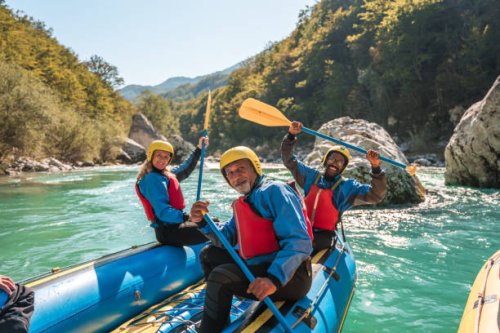 diverse mature group river rafting in natural setting - travel stock pictures, royalty-free photos & images