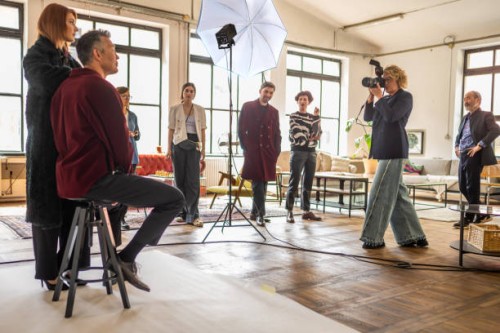 diverse models and crew during photoshoot prep - fashion stock pictures, royalty-free photos & images
