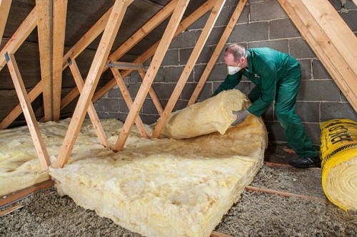 diy loft insulation by homeowner. - home decoration stock pictures, royalty-free photos & images