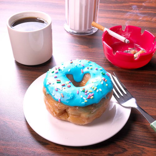 donut and smoking - junk food stock pictures, royalty-free photos & images