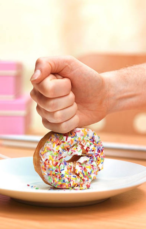 doughnut just say no - junk food stock pictures, royalty-free photos & images
