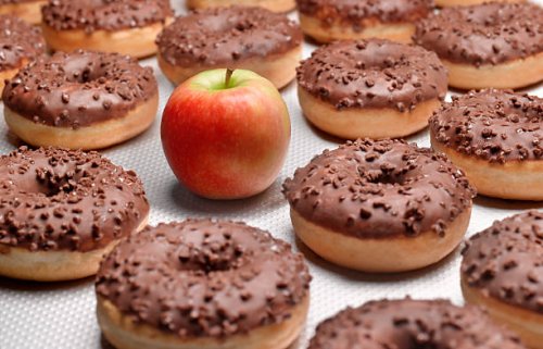 doughnuts chocolate, with apple - junk food stock pictures, royalty-free photos & images