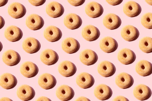 doughnuts on the pink background - junk food stock pictures, royalty-free photos & images