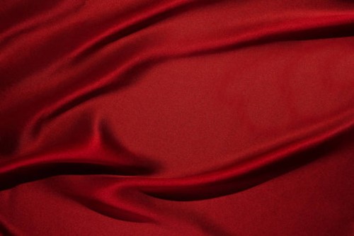 draped red silk background - fashion stock-fotos und bilder