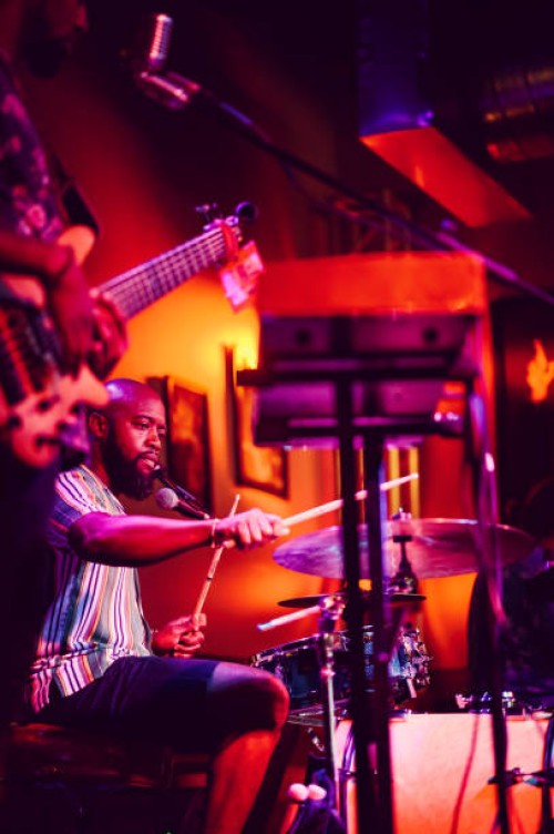 drummer musician performing on stage - concert stock pictures, royalty-free photos & images