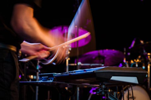 drummer playing rock music on concert - concert stock pictures, royalty-free photos & images