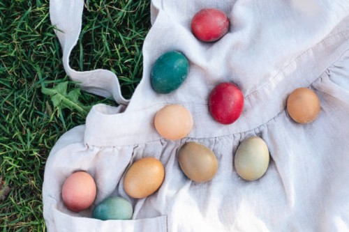 easter rustic colored eggs on linen cloth on the grass against blurred green background,belarus - garden decoration stock pictures, royalty-free photos & images
