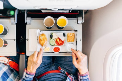 eating airplane food during a flight, personal perspective directly above view - food stock pictures, royalty-free photos & images
