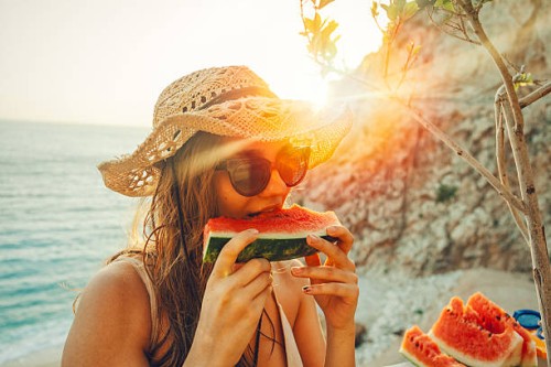 eating and enjoying watermelon - food stock pictures, royalty-free photos & images