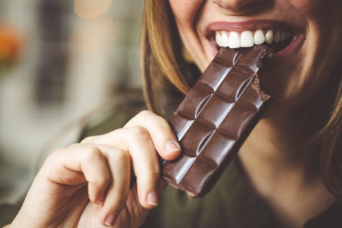 eating chocolate - food stock pictures, royalty-free photos & images