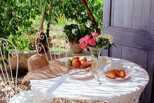 eating in the garden under a peach tree - garden decoration stock pictures, royalty-free photos & images