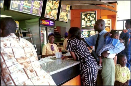 Elections, Illustration in Accra, Ghana in October, 2000 - OSU area, Cantonments street, the trendy street of Accra, Fast-food 'Steers', a South...