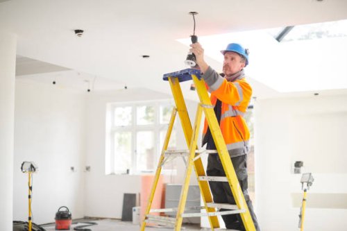 electrician installing downlights - home decoration stock pictures, royalty-free photos & images