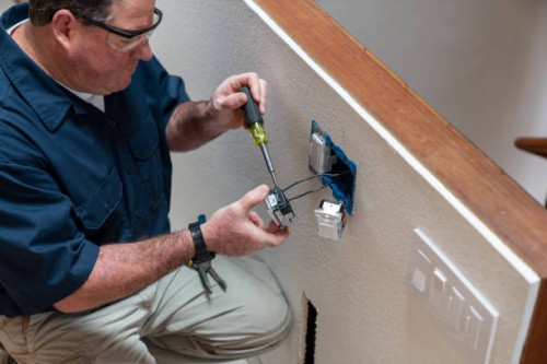 electrician installing light switch in home - home decoration stock pictures, royalty-free photos & images