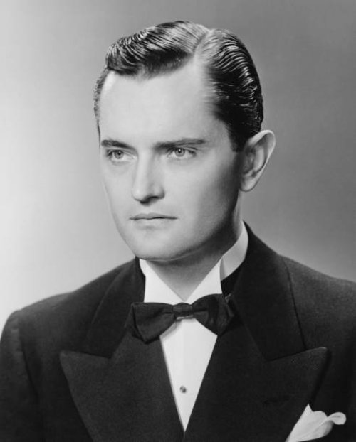 elegant man posing in studio, (b&w), close-up, portrait - hairstyle stockfoto's en -beelden