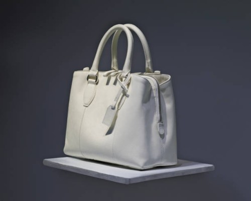 elegant white leather handbag on display - fashion stock pictures, royalty-free photos & images