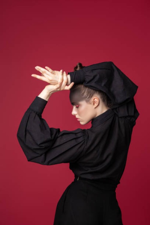 elegant woman in stylish wear in studio - fashion stock pictures, royalty-free photos & images
